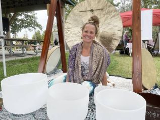 Laura Ireland of Expressions for the Soul and her quartz crystal singing bowls.